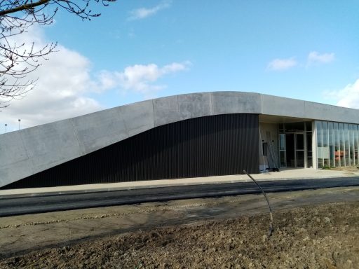 pose d'un bardage et isolation façade salle des fêtes